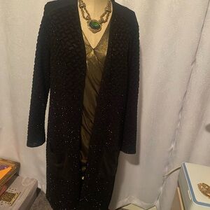 Final Act. Class act. Metallic duster 🖤unique glamour at best.💄